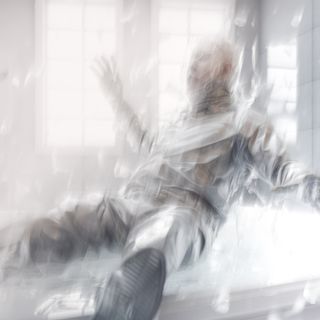 transcendental 3d animated man in bright laboratory like room falling down with glass shard but also plastic like particles all around him